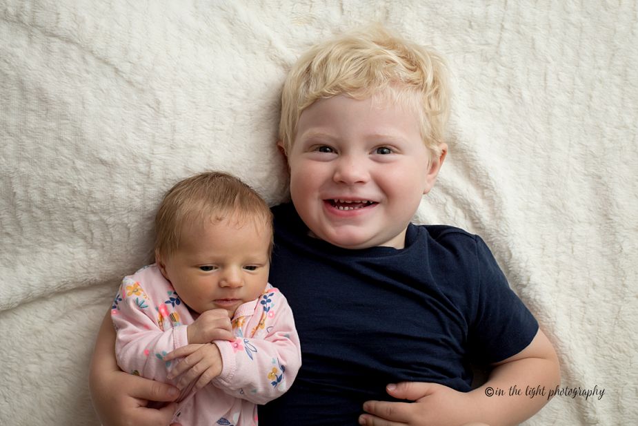 newborn baby and brother