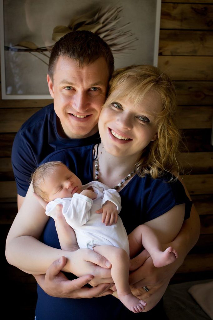 newborn baby and parents