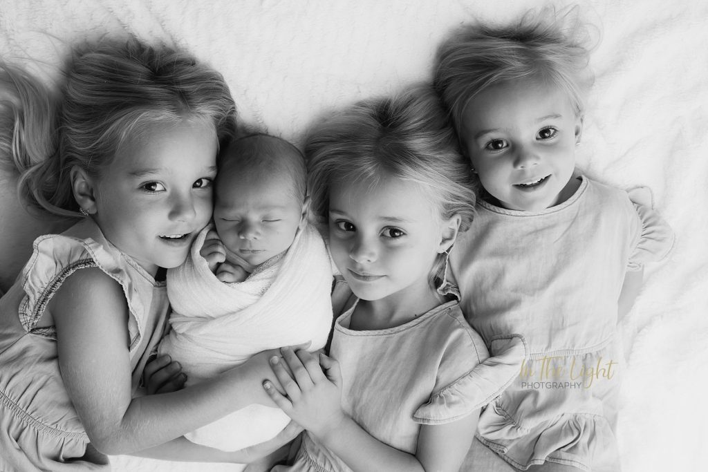 Newborn baby boy and his three beautiful sisters during his newborn session in Centurion.