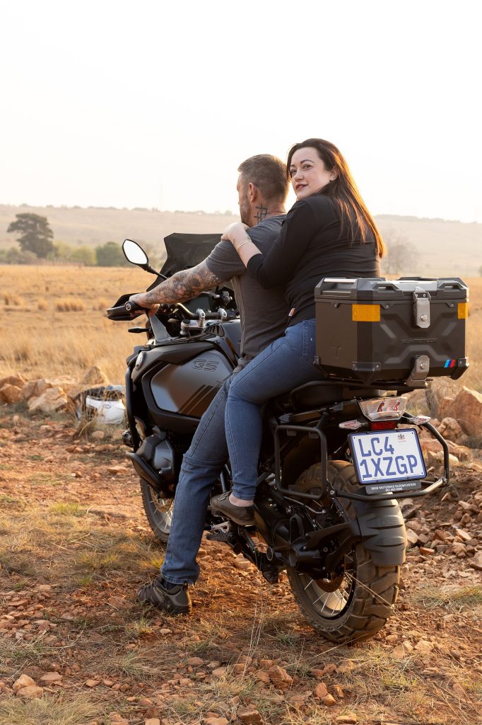 A couple posing on their beautiful motorbike during a family photo session in Pretoria.